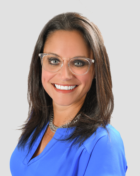 Melissa_Radovanic_Head_Shot_2022_-_gray_background